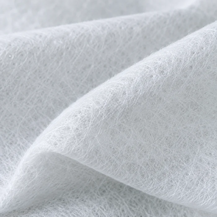 Soft white non-woven material — concept cover